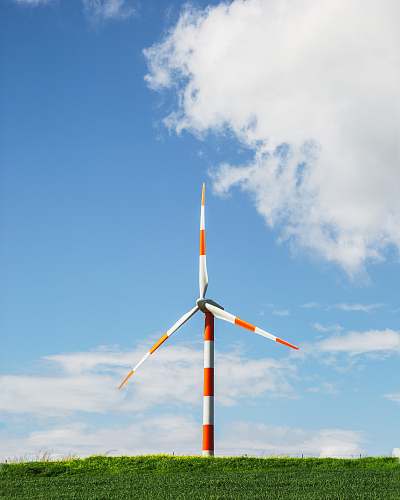 wind turbine white and orange industrial wind mill motor